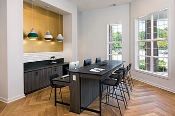 Business center with mac/pcs and wireless printing